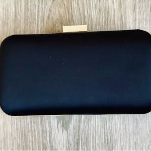 Giorgio Armani sleek black clutch